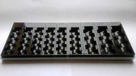 Plastový mincovník na Kč